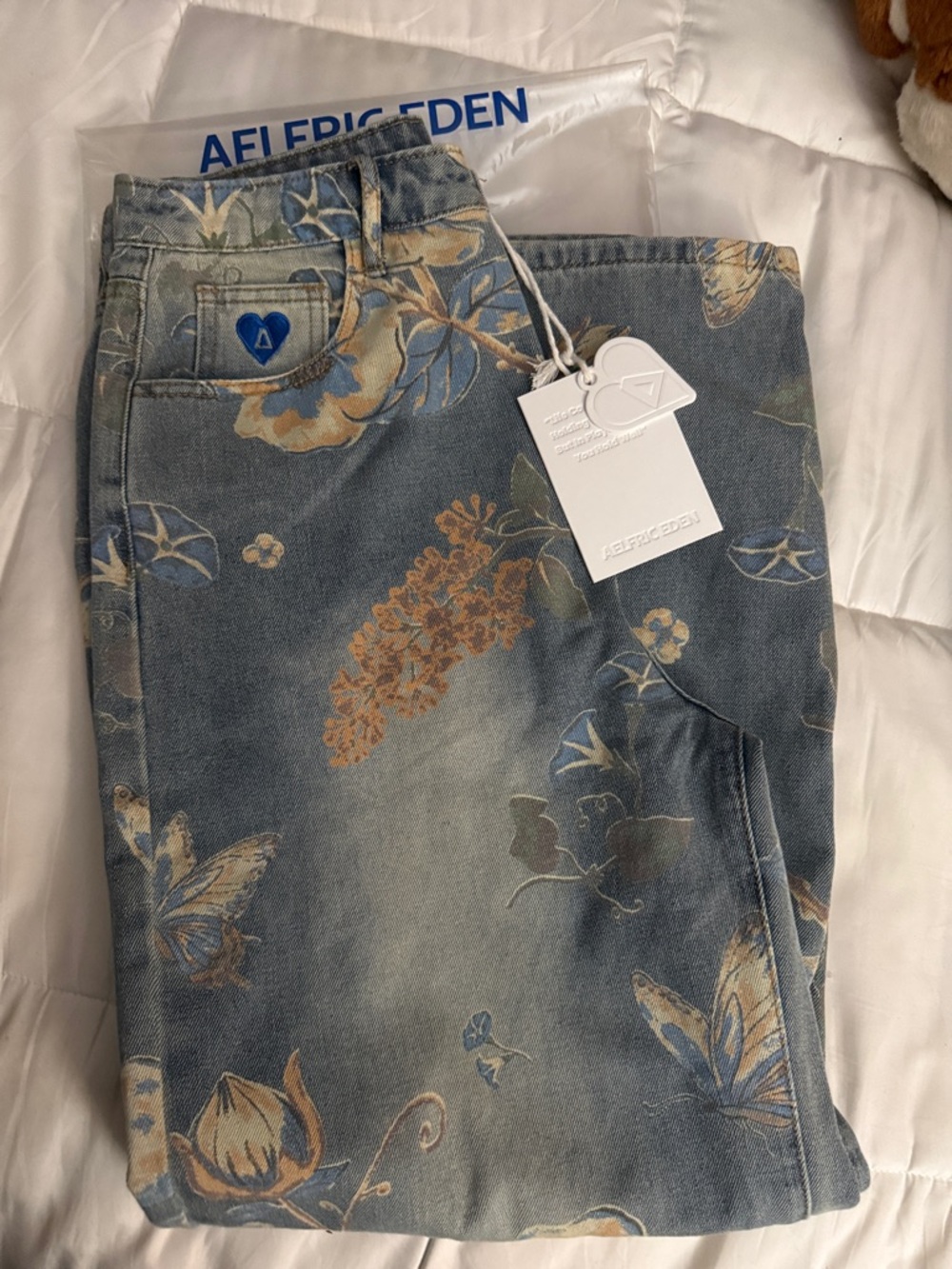 AELFRIC EDEN FLORAL BAGGY JEANS
Size 30 unisex NEW w tags 
Wide-Leg Jeans - Blue
